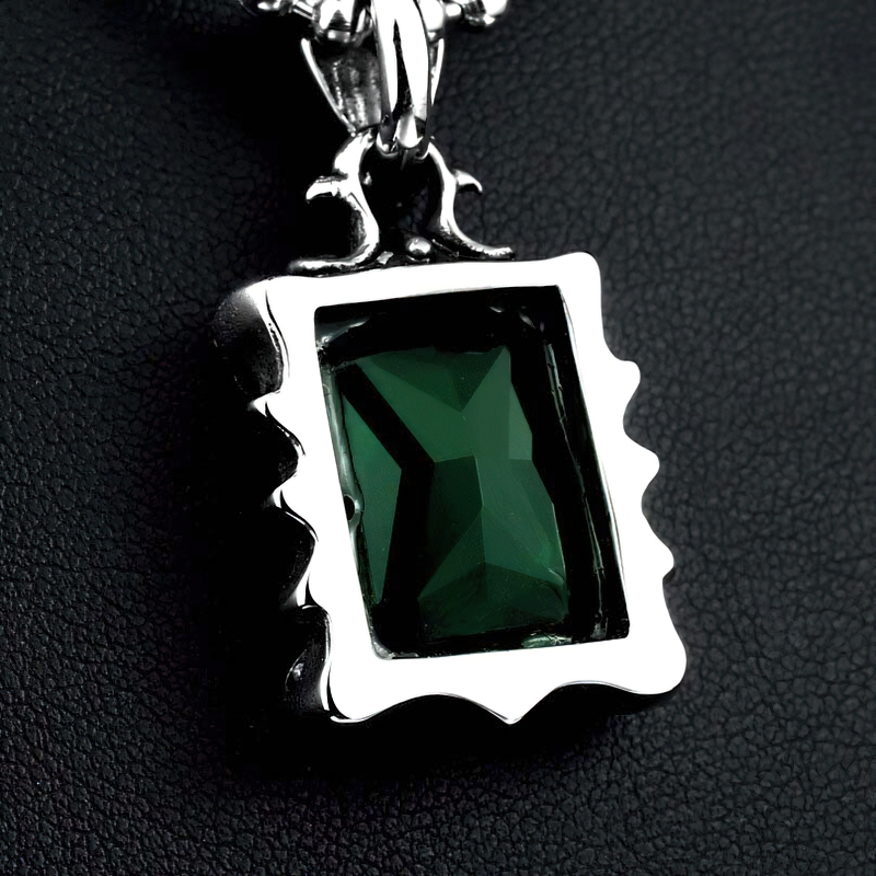 Unisex stainless steel pendant with a green stone, showcasing gothic style and casual fashion accessories.
