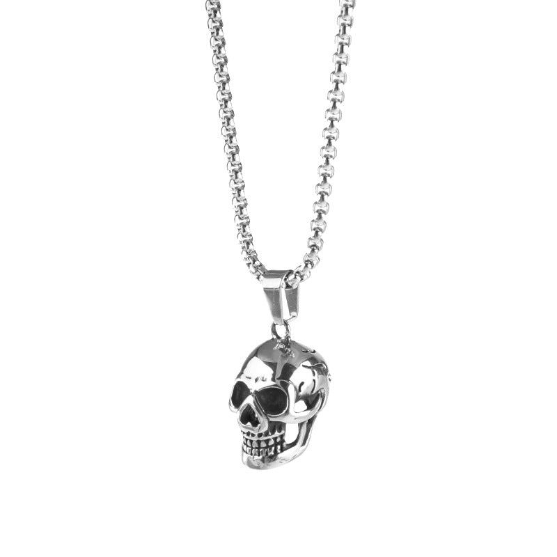 Unisex stainless steel skull necklace with O-chain, perfect for rock style jewelry. Available in black, gold, and silver.