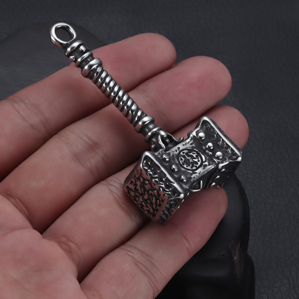 Unisex Viking pendant featuring Mjolnir, crafted in stainless steel, perfect for Thor fans and alternative fashion.