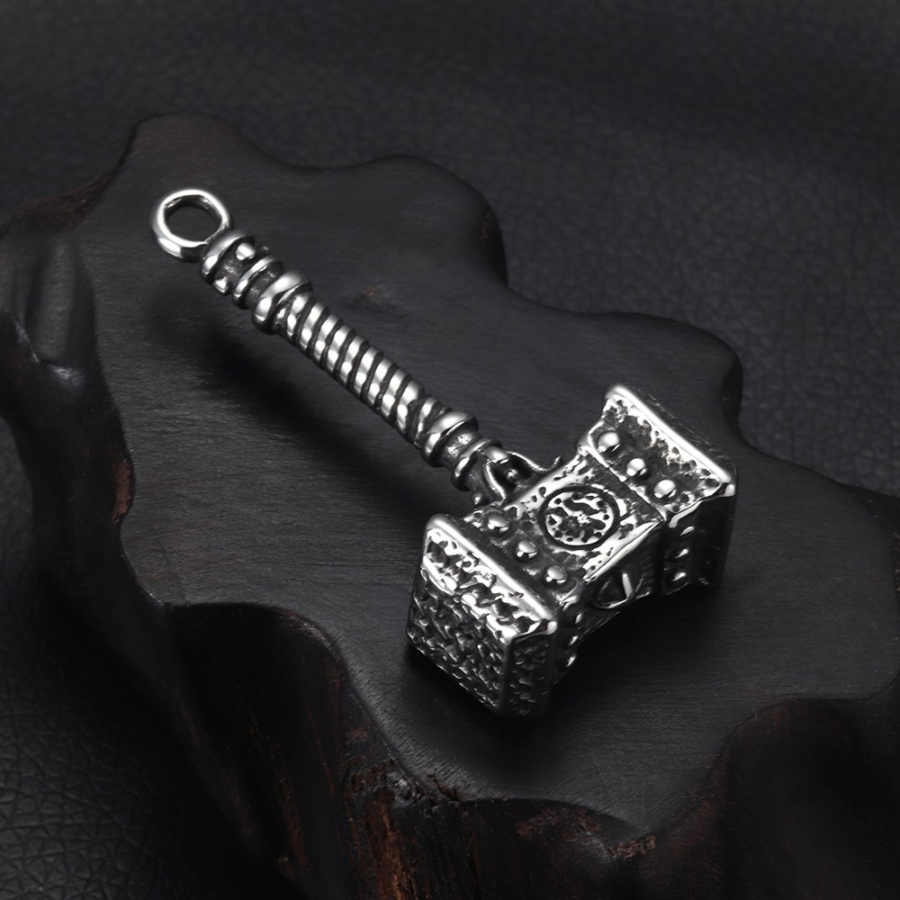 Unisex Viking pendant shaped like Mjolnir, crafted in stainless steel, perfect for cosplay and alternative fashion.