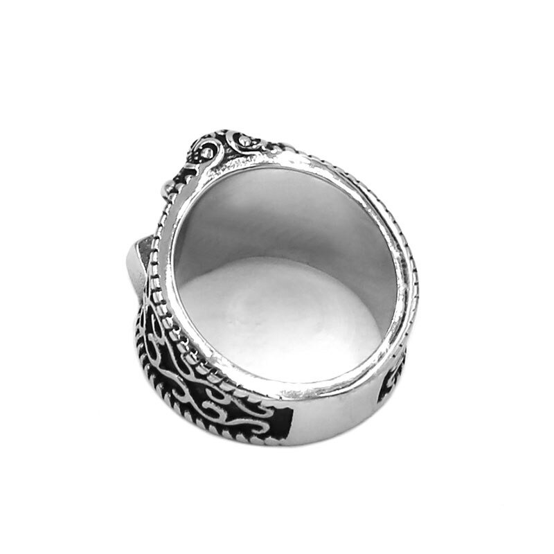 Unisex Viking ring with Celtic knot design, showcasing detailed Thor hammer engraving in stainless steel.