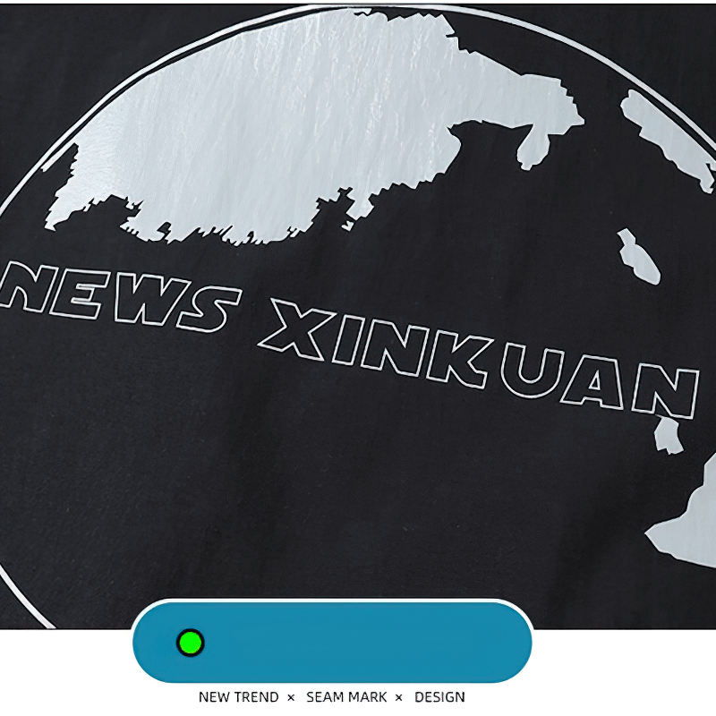 Close-up of a trendy black fabric showcasing the text 'NEWS XINKUAN' and a map design, perfect for fashion-forward outfits.