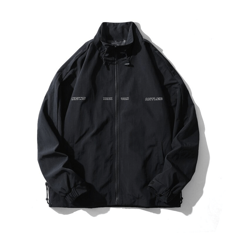 Unisex oversized zipper windbreaker jacket in black with stylish printed text, perfect for casual wear.
