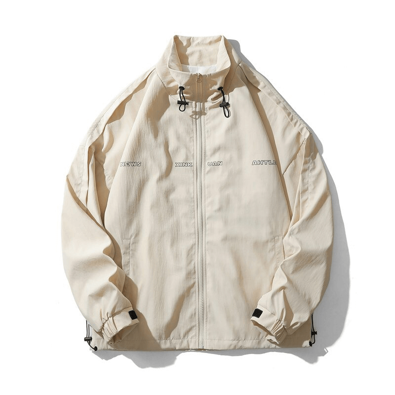 Unisex oversized windbreaker jacket in beige with stylish print, perfect for casual outings.
