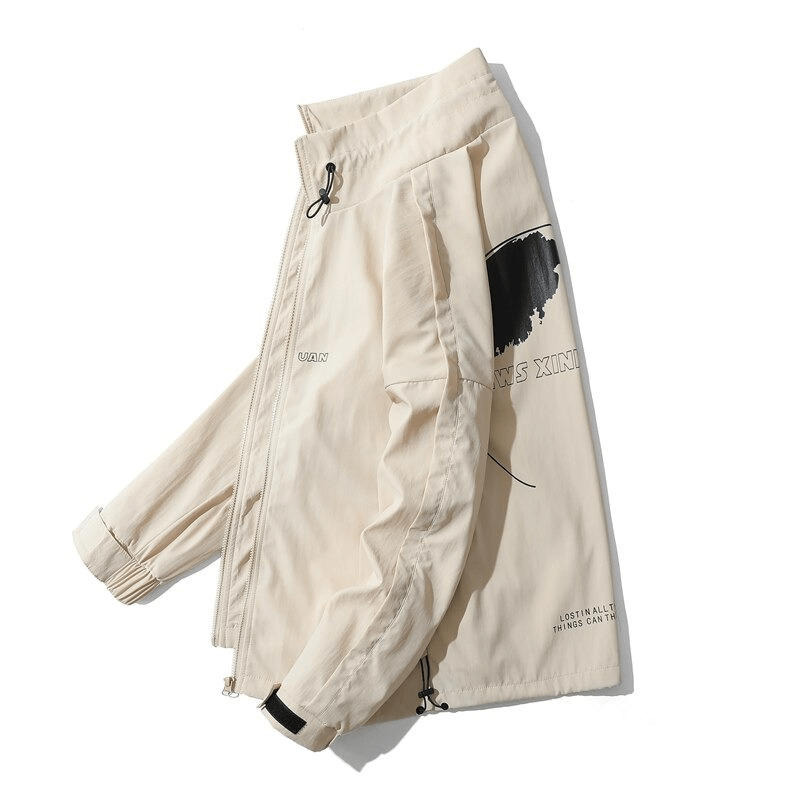 Unisex oversized windbreaker jacket in light beige with stylish print, perfect for casual wear.