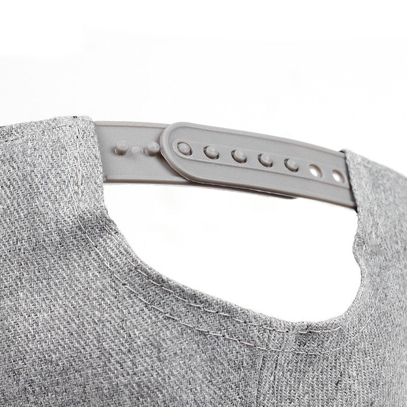 Adjustable strap detail of a grey baseball cap, perfect for a comfortable fit.
