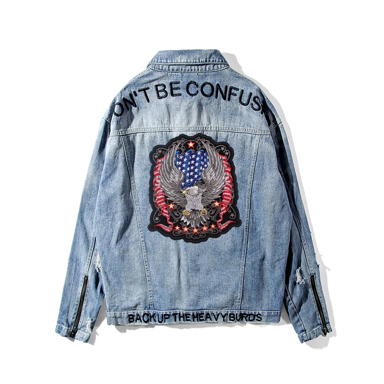 Denim jacket with USA flag eagle patch and text 'Don't Be Confused' for stylish biker fashion.