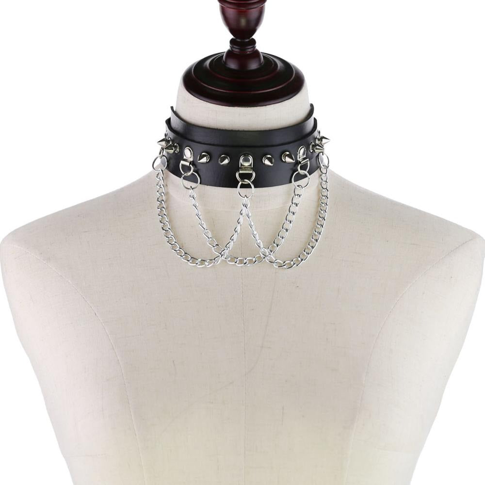 Vegan leather gothic choker with zinc alloy spikes and chains on a mannequin, perfect for festival outfits.