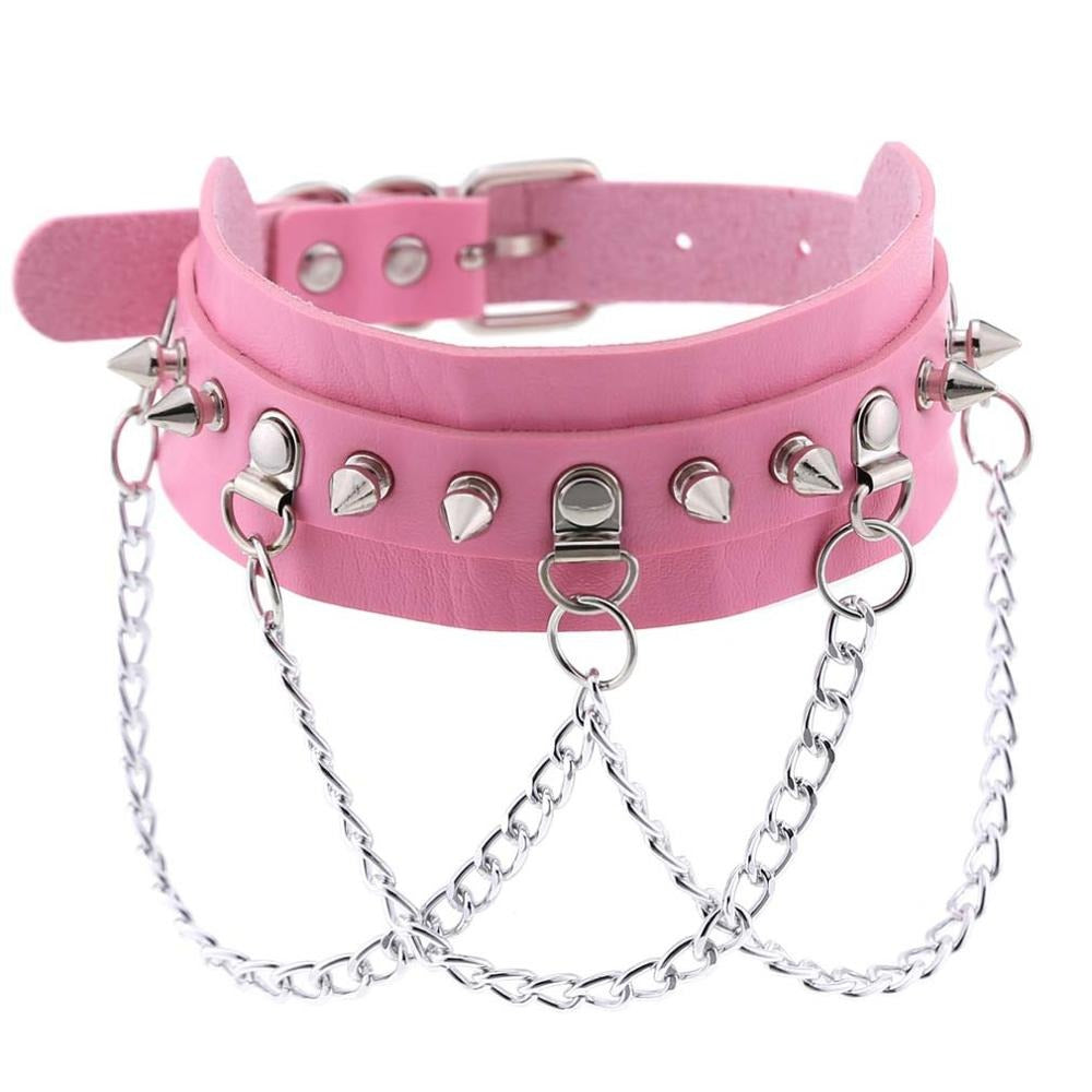 Vegan leather pink gothic choker with zinc alloy spikes and chains, perfect for festivals and edgy outfits.