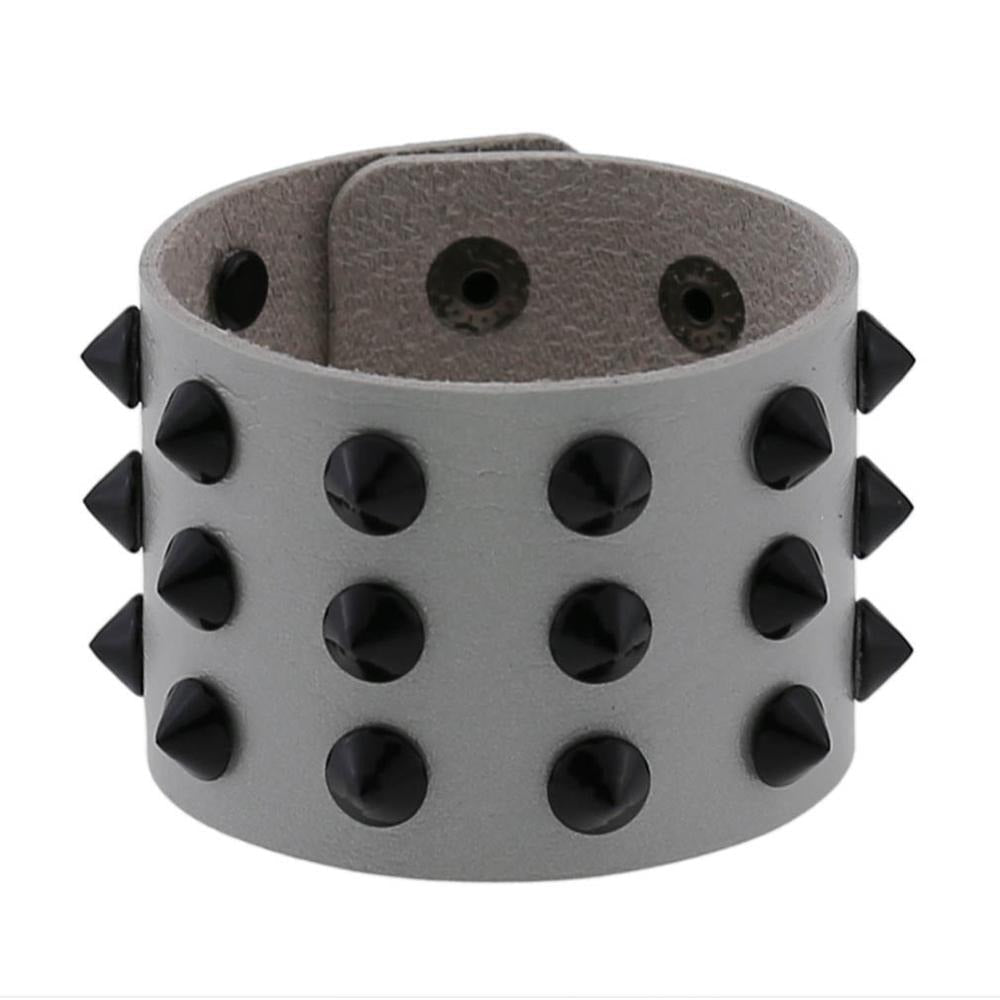 Vegan leather spike bracelet in gray with black spikes, adjustable wristband for men and women, stylish and edgy accessory.