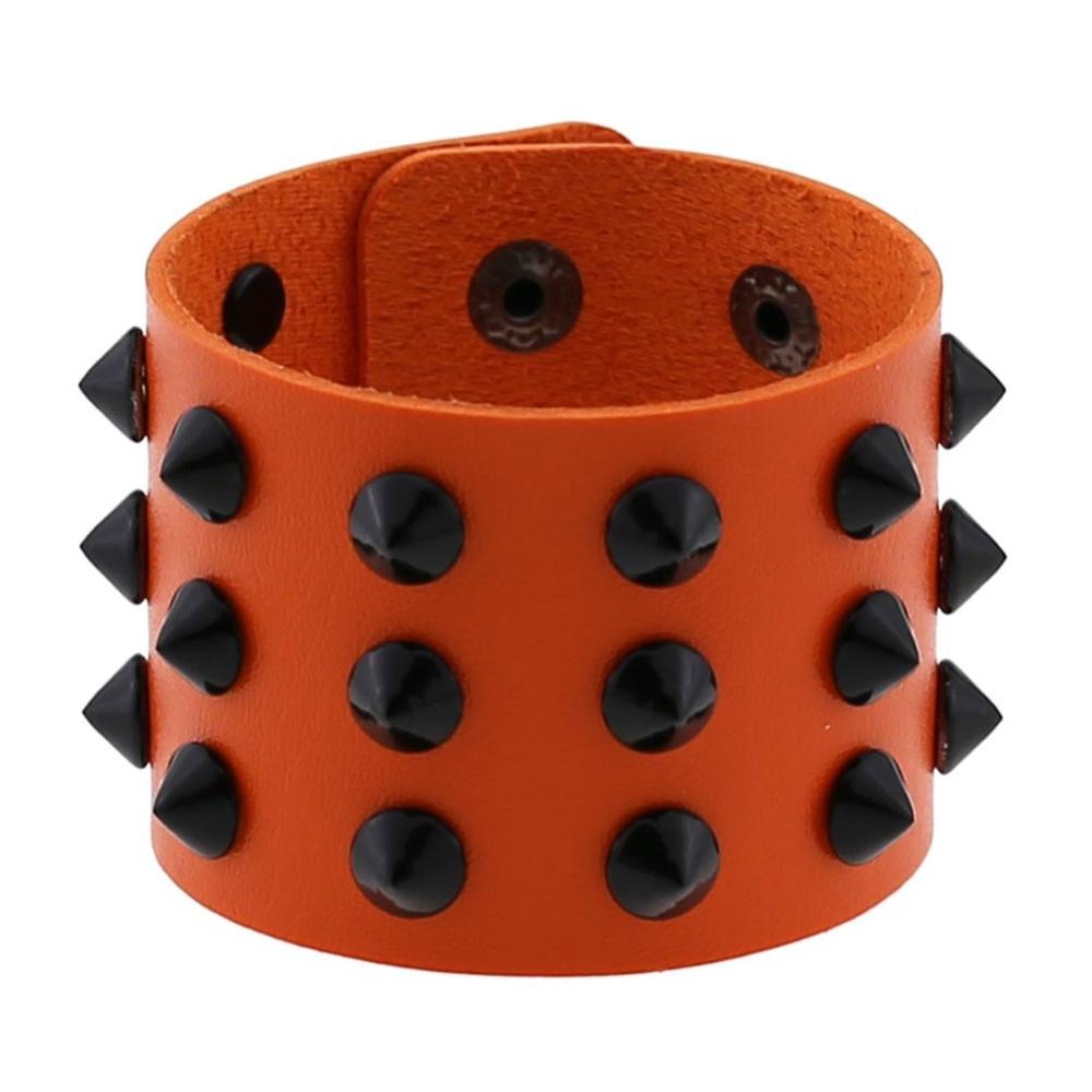 Vegan leather spike bracelet in orange, featuring black studs and rivets for a bold, adjustable wrist accessory.
