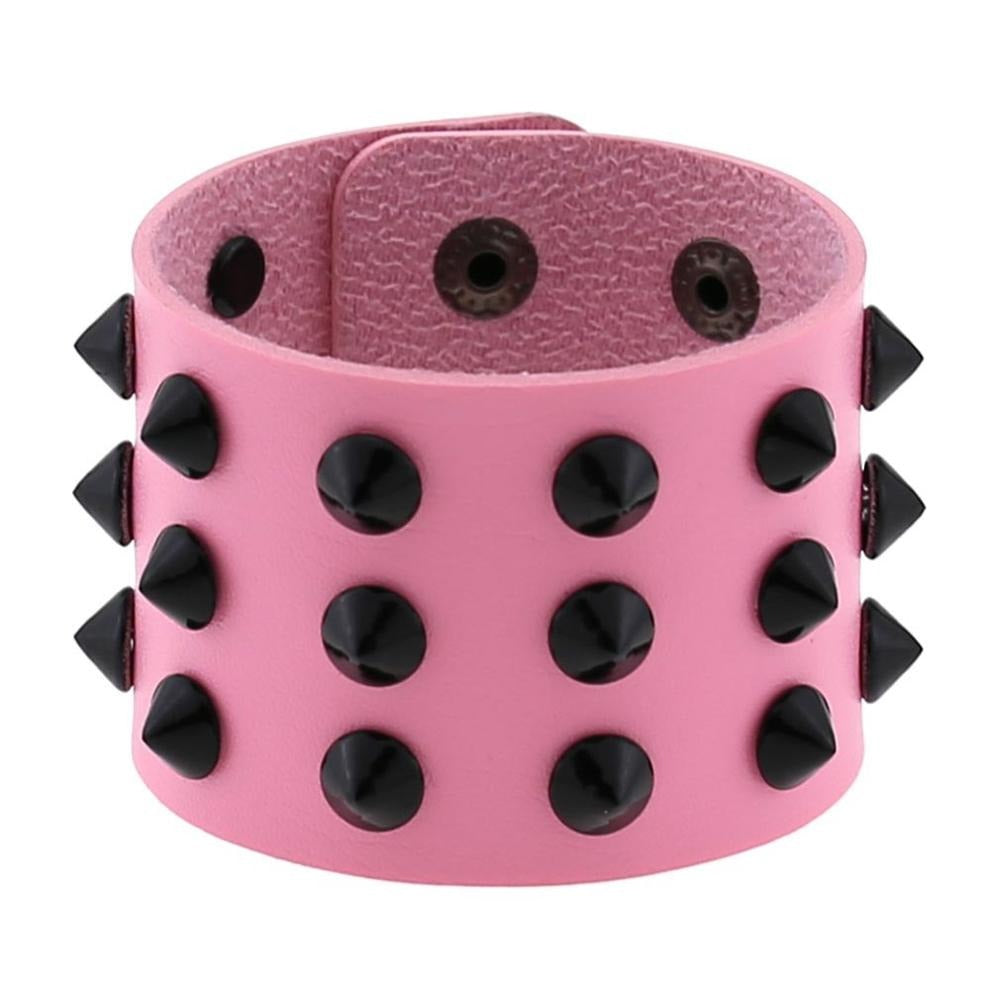 Pink vegan leather spike bracelet with black rivets, adjustable wristband for men and women.