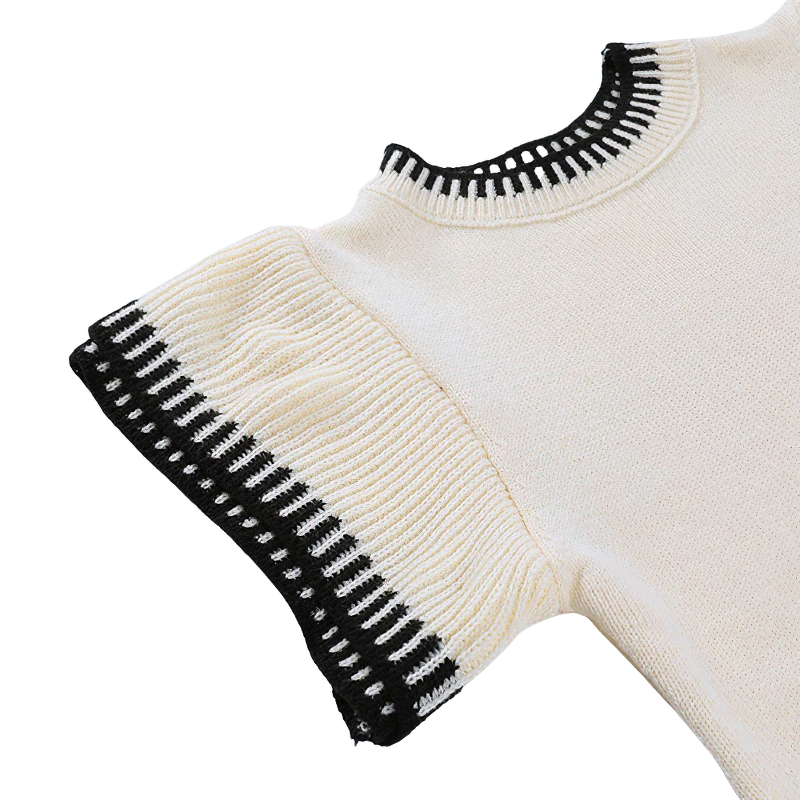 Stylish women's knitted O-neck short top featuring unique black and cream detailing, perfect for casual streetwear.