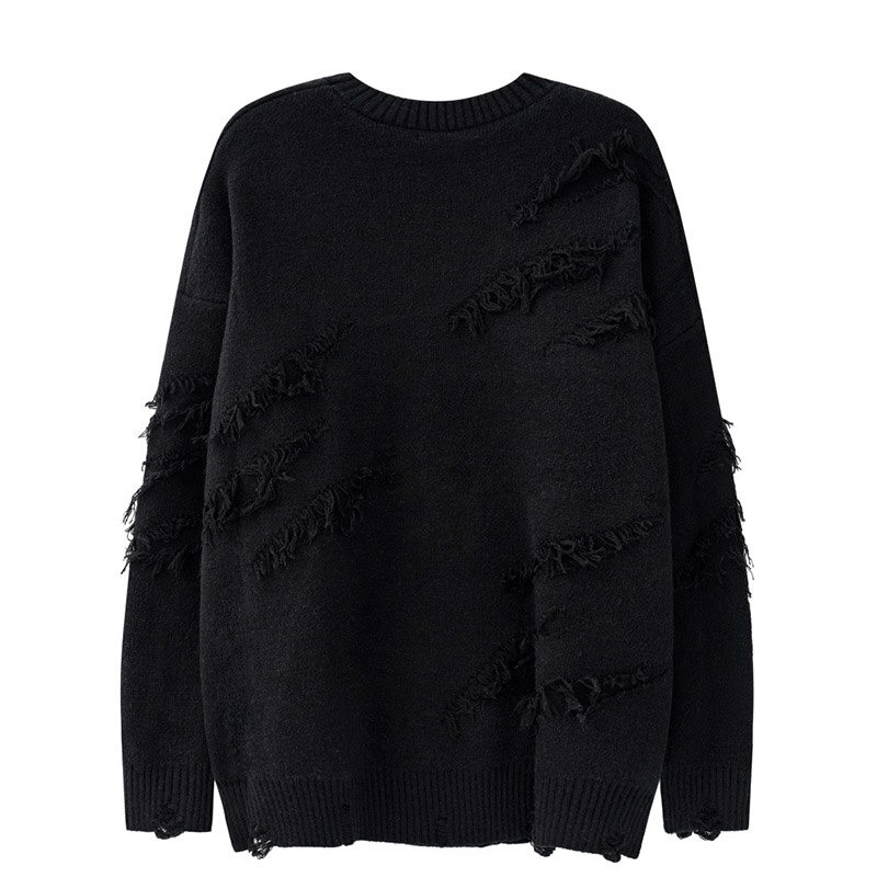 Vintage black oversized knitted sweater with ripped details, perfect for stylish men's vintage outfits.