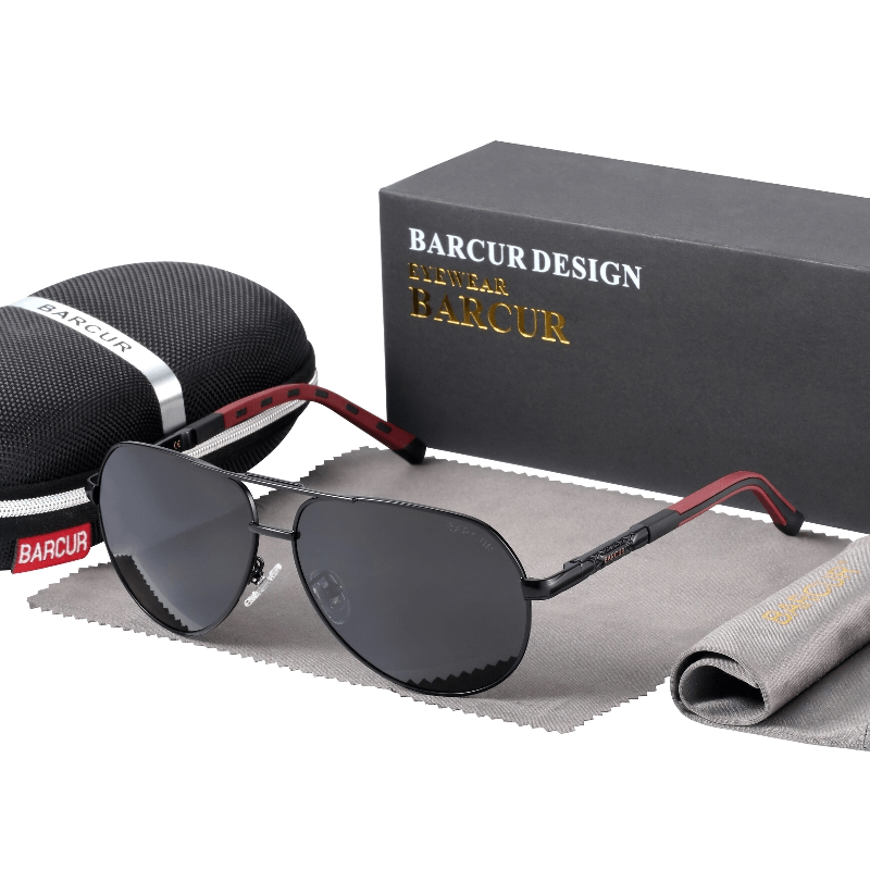 Vintage unisex aluminum polarized sunglasses with black lenses and red accents, displayed with a case and cleaning cloth.