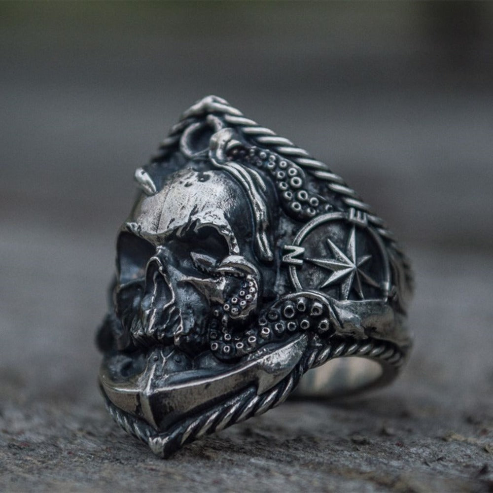 Vintage skull ring with compass and octopus tentacles, perfect punk biker jewelry for unique style.