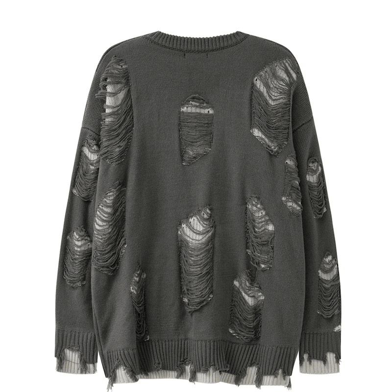 Vintage gray oversized knitted sweater with ripped design, perfect for casual wear.