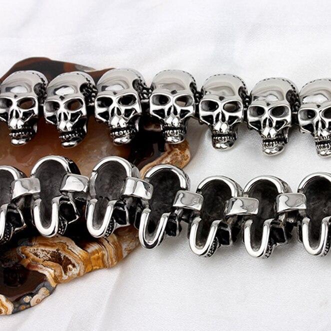 Vintage biker steel skull necklace showcasing intricate skull designs for punk and goth styles.