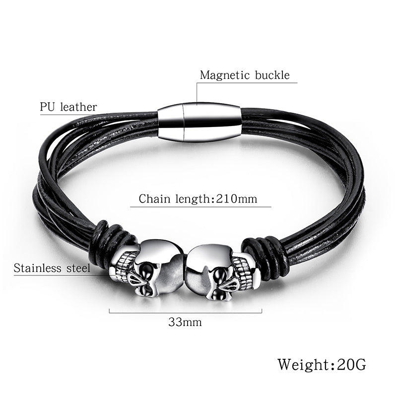 Vintage black double skull bracelet for men and women, made of stainless steel and PU leather, featuring a magnetic buckle.