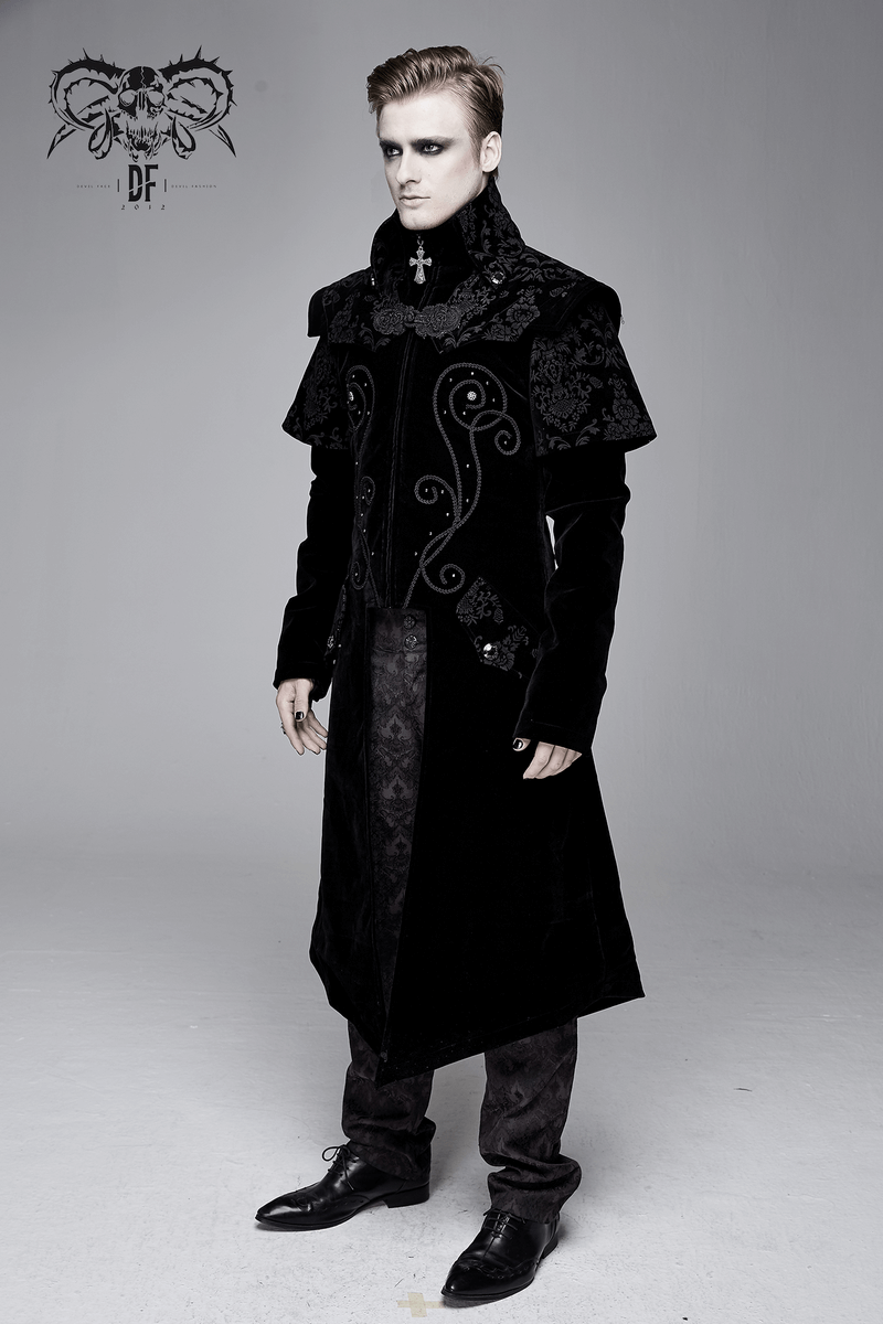 Vintage black long velvet gothic coat for men, featuring unique cross accents and intricate patterns.
