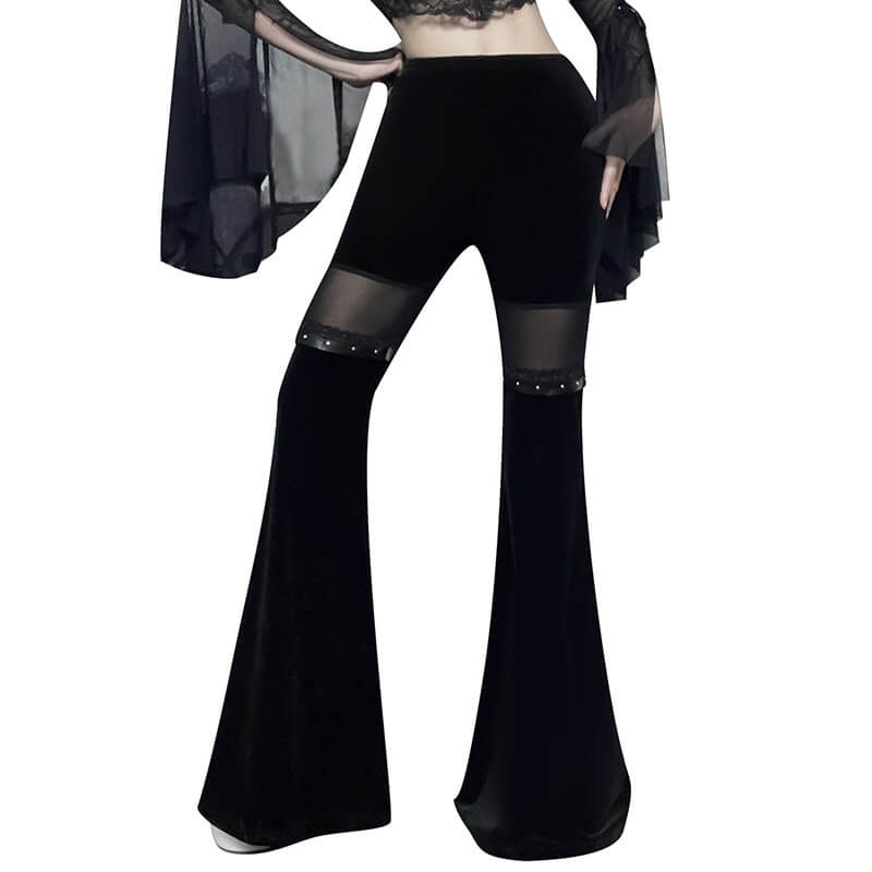 Vintage black velvet flare pants with mesh inserts for a cool gothic style look.