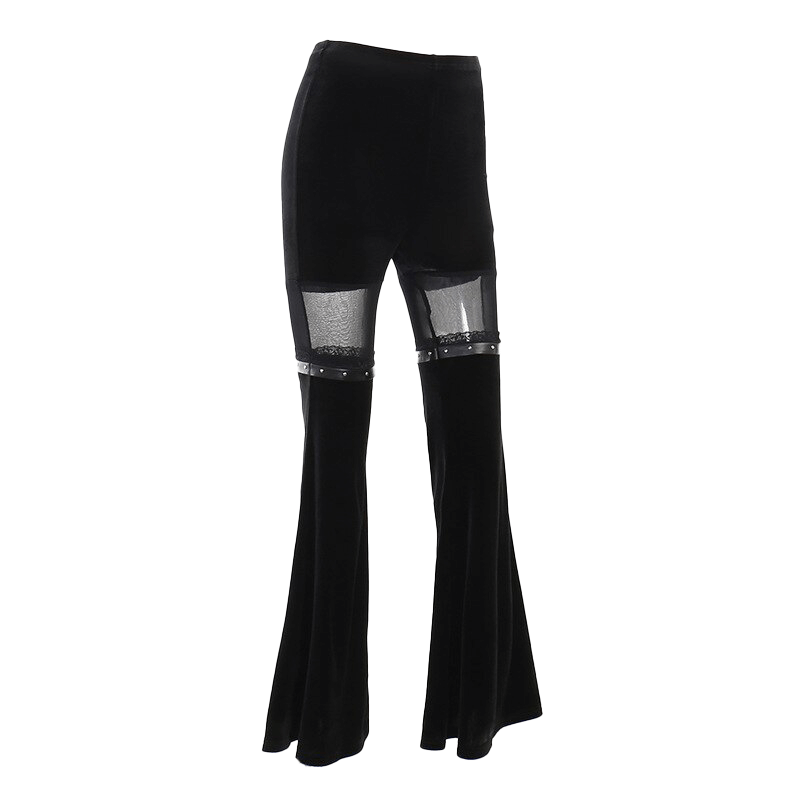 Vintage black velvet flare pants with mesh inserts, perfect for a gothic style look.