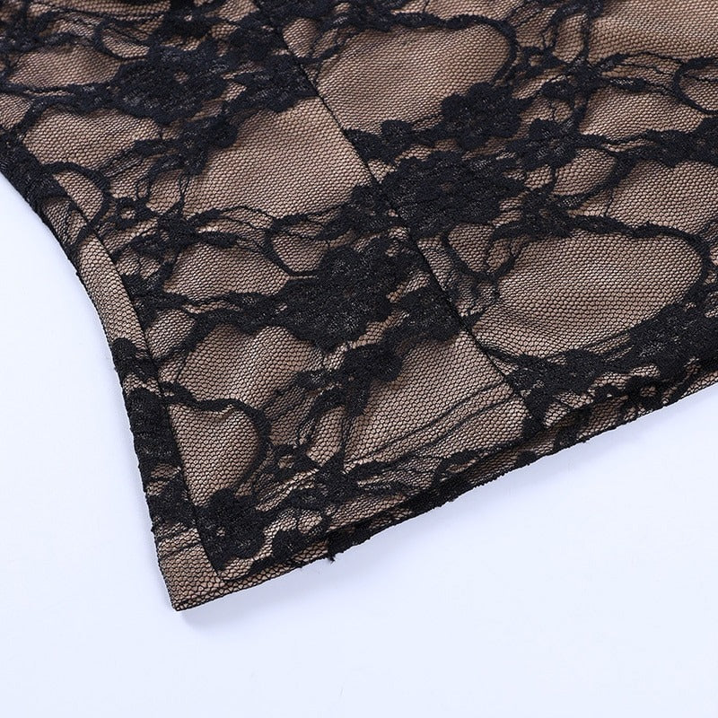 Close-up of vintage black lace fabric, showcasing intricate patterns for a sexy goth style women's top.