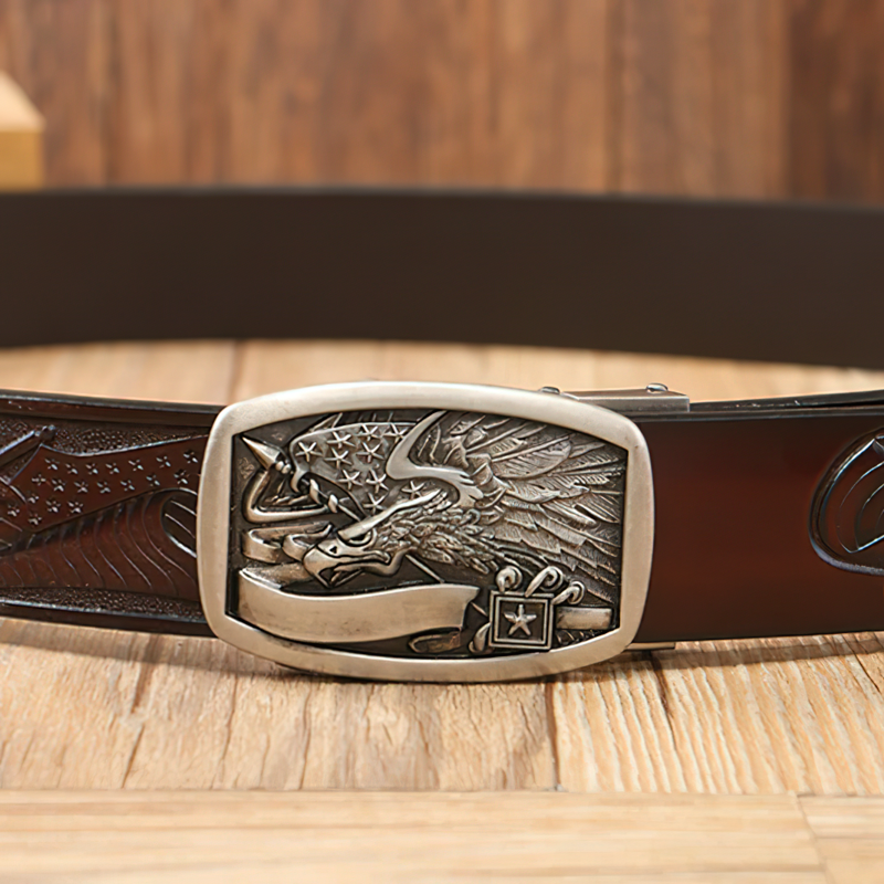 Vintage cowboy leather belt with eagle buckle, perfect for a stylish rock-inspired look.