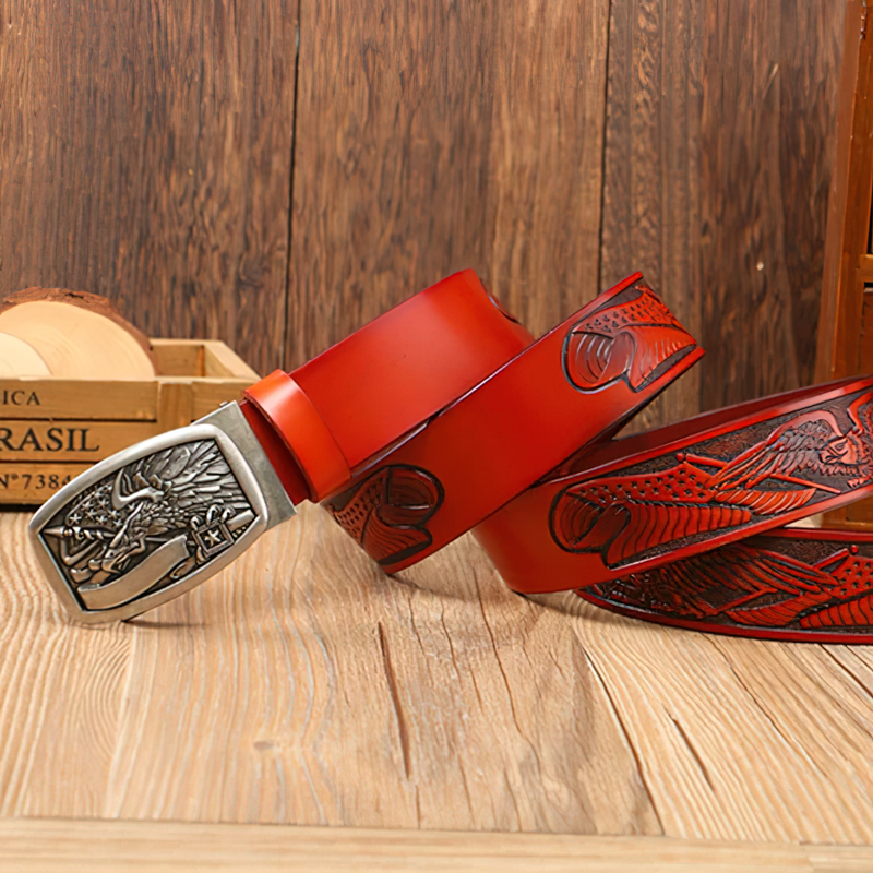 Vintage cowboy genuine leather belt with eagle buckle, retro style men's accessory on wooden background.