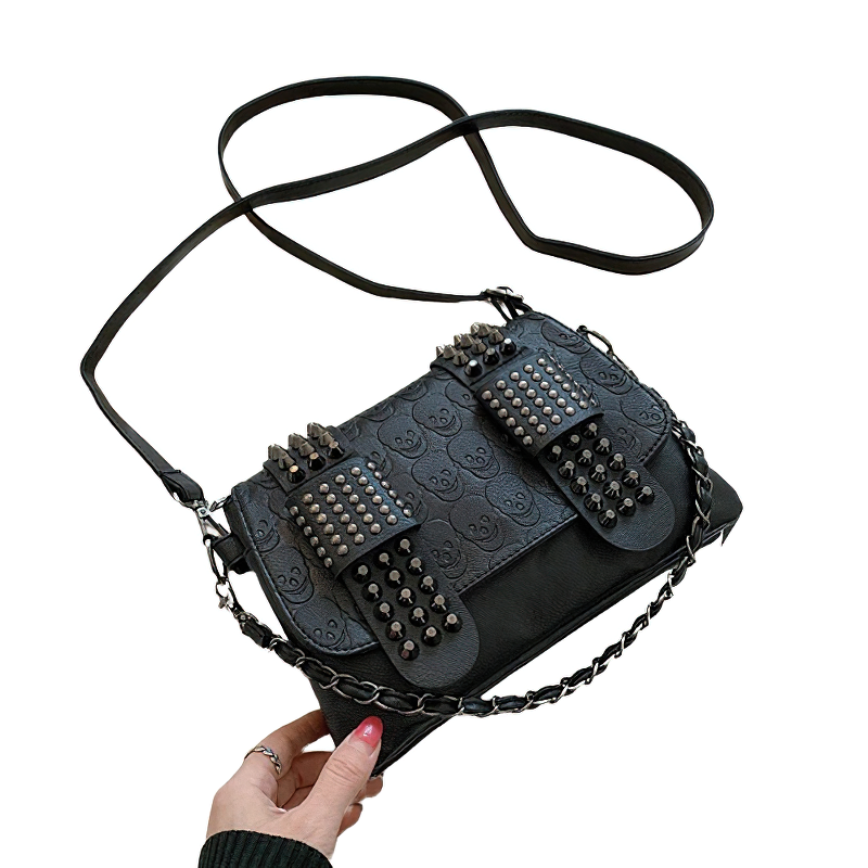 Vintage women's crossbody bag with rivets, stylish PU leather accessory for trendy looks.