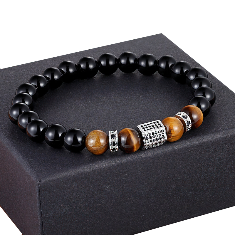Vintage cubic zircon bracelet for men, featuring matte onyx and tiger eye stones on a stylish box.
