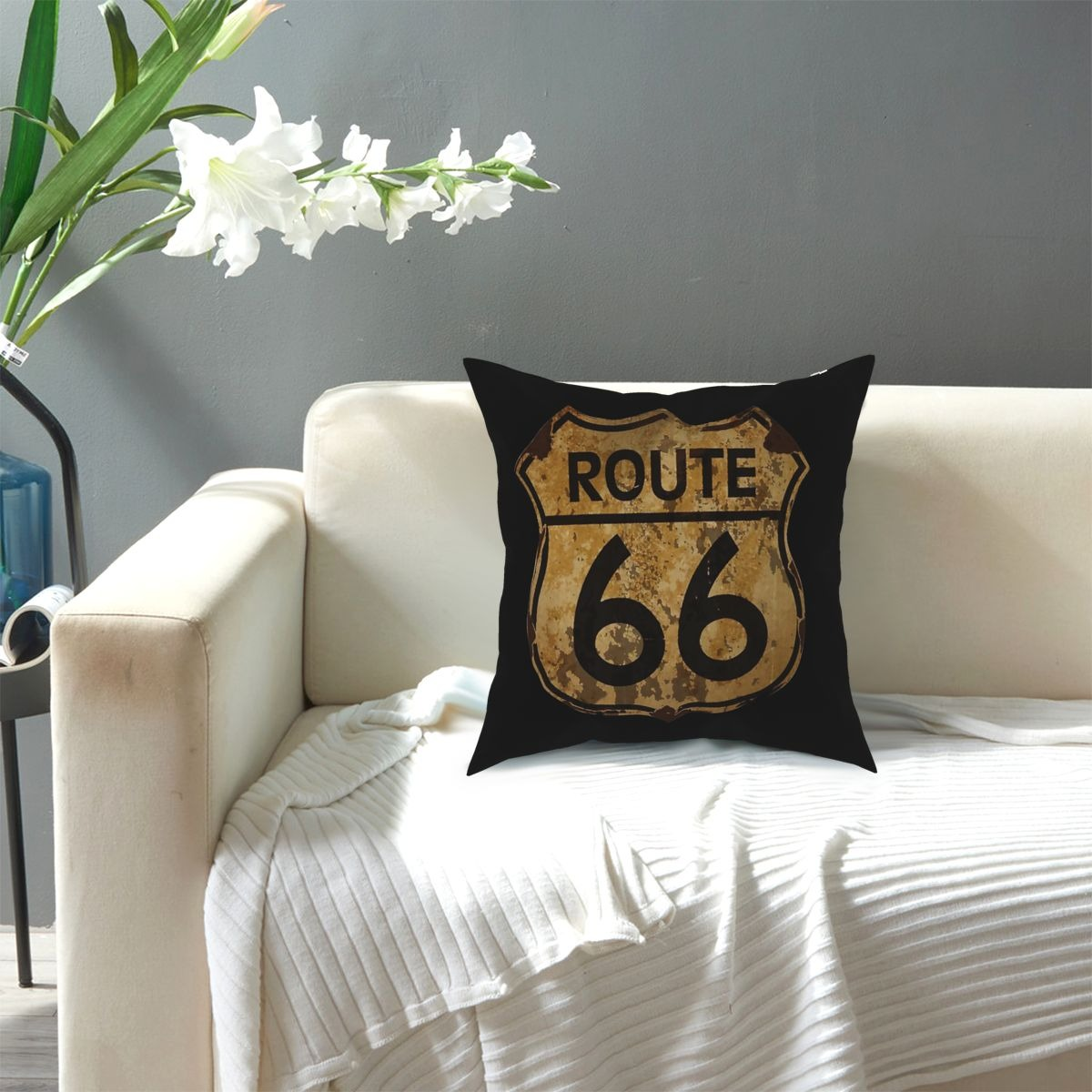 Vintage Route 66 decorative pillow on a cozy couch, perfect for vintage home decor.