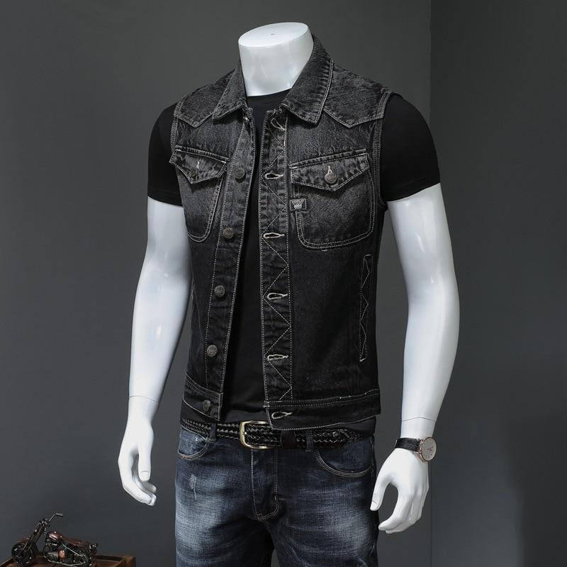 Men's vintage sleeveless denim biker vest on mannequin, perfect for rock outfits and edgy style.