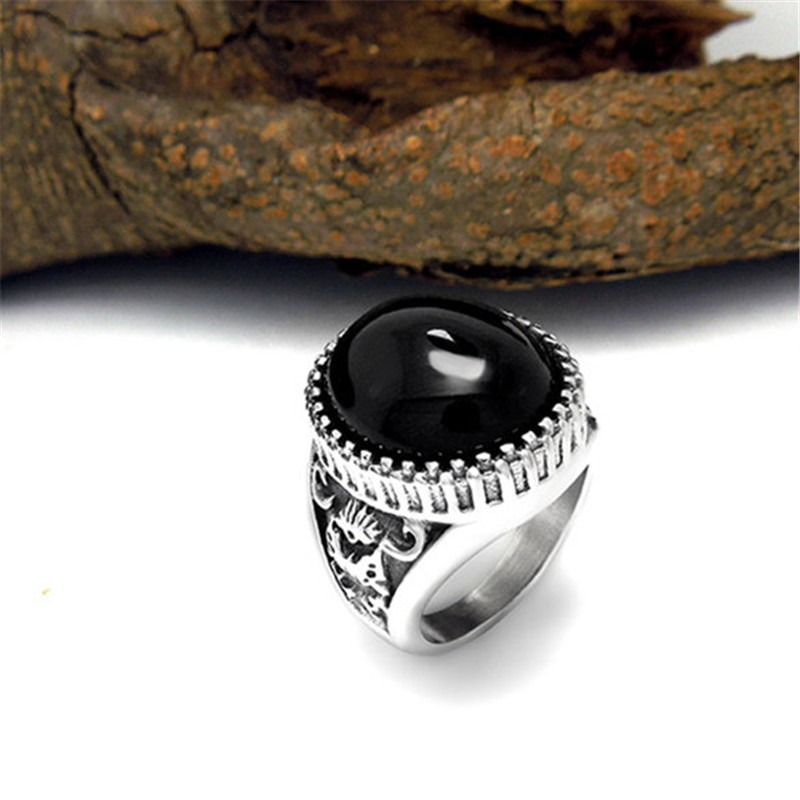 Vintage unisex stainless steel ring with large black stone, perfect for alternative fashion and stylish gifting.
