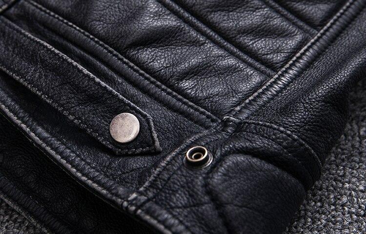 Close-up of black biker leather vest showcasing stylish hardware and intricate stitching details, perfect for rock style outfits.