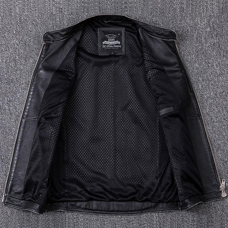 Interior view of a black biker leather vest, showcasing mesh lining and zipped pockets for practicality in rock style outfits.