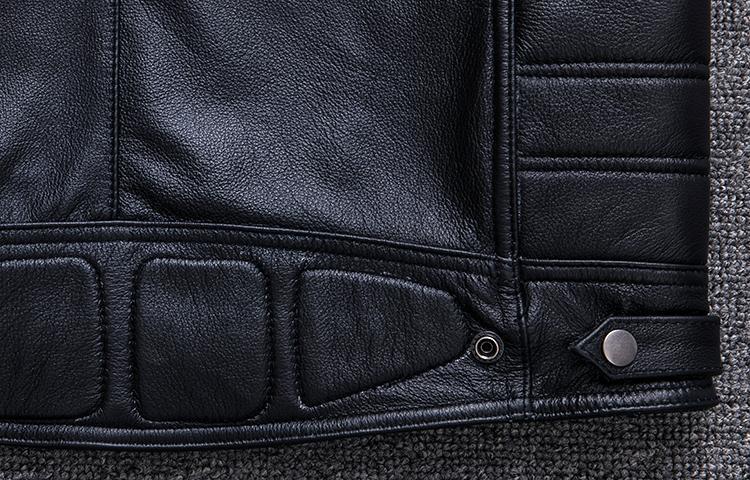 Close-up of a black leather biker vest featuring quilted detailing and snap closures, ideal for rock and goth styles.