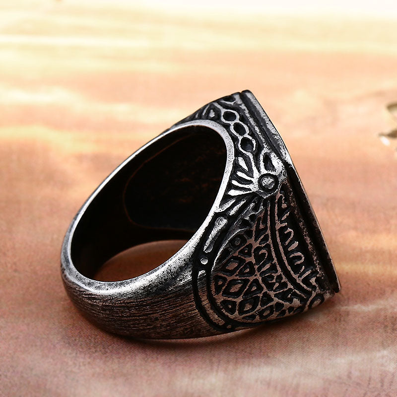 Vintage stainless steel ring with geometric design, perfect for bikers or anyone wanting bold jewelry.