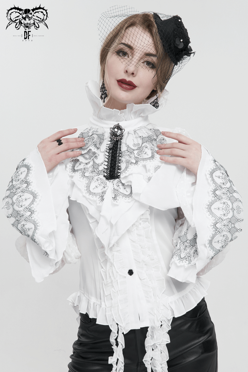 Gothic style model in a white blouse with ruffled lace detailing and a stylish black veil accessory.