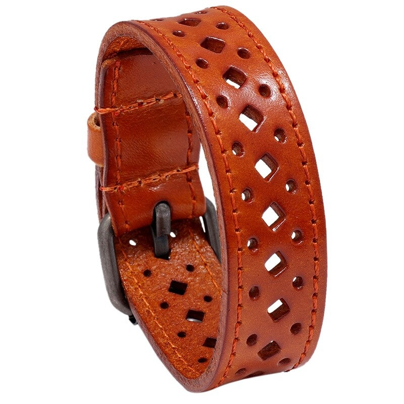 Vintage genuine leather bracelet with geometric pattern, adjustable wide bangle for men and women, in warm orange.