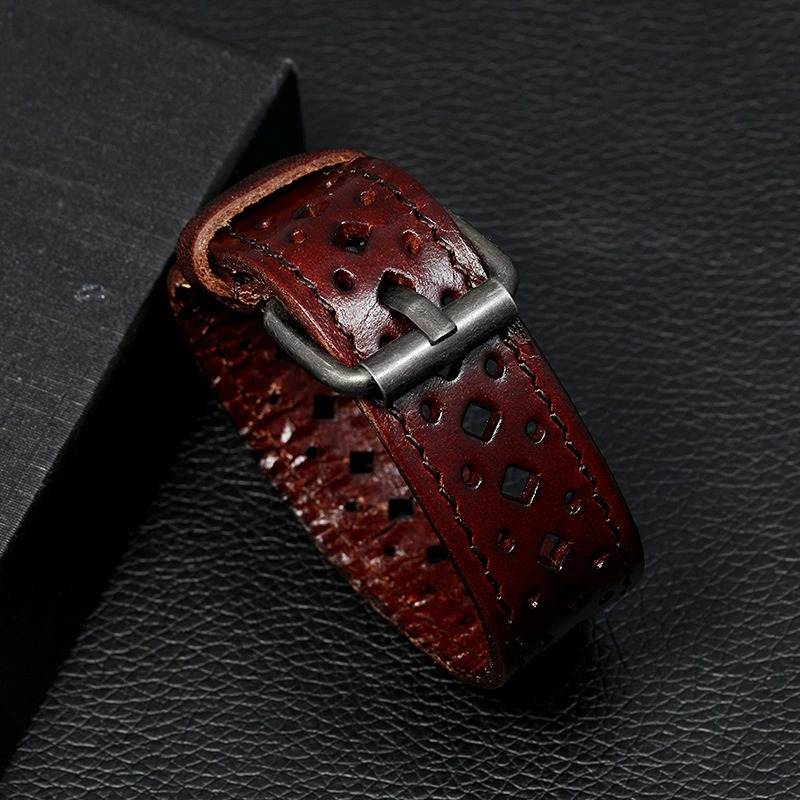 Vintage leather bracelet with geometric pattern, adjustable bangle for men and women, rich brown color.