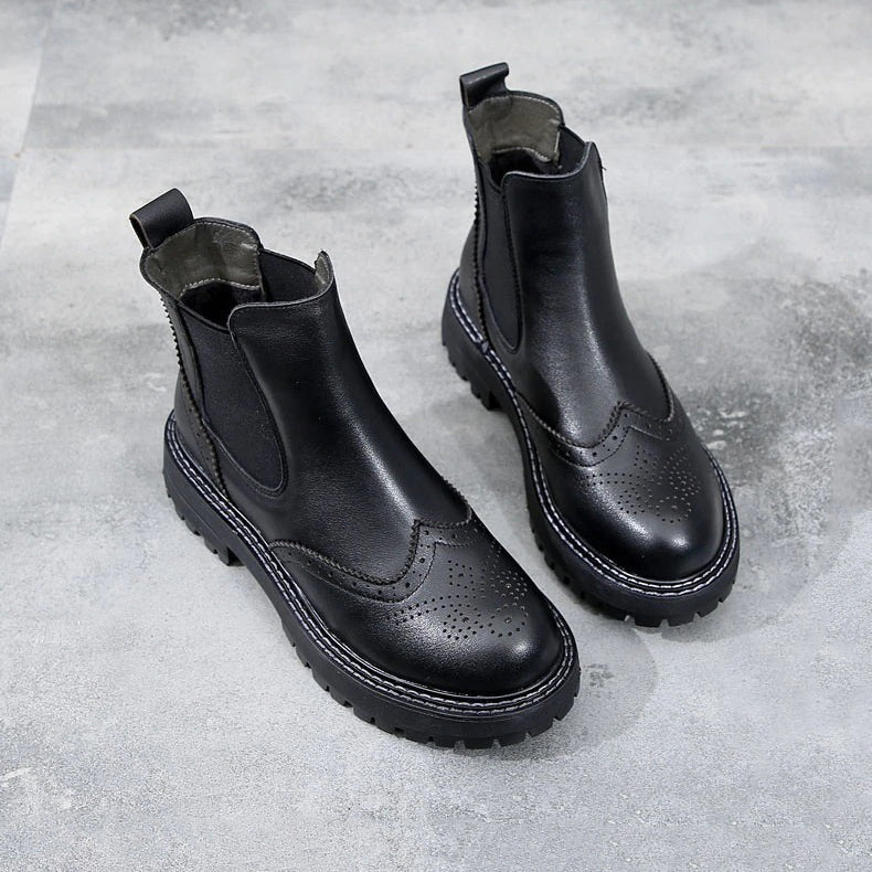 Stylish vintage black genuine leather flat ankle boots for ladies, perfect for spring, autumn, and winter outfits.