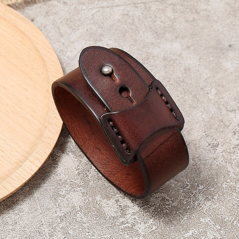 Vintage genuine leather wide cuff bracelet with minimalist design, perfect unisex accessory for punk style lovers.