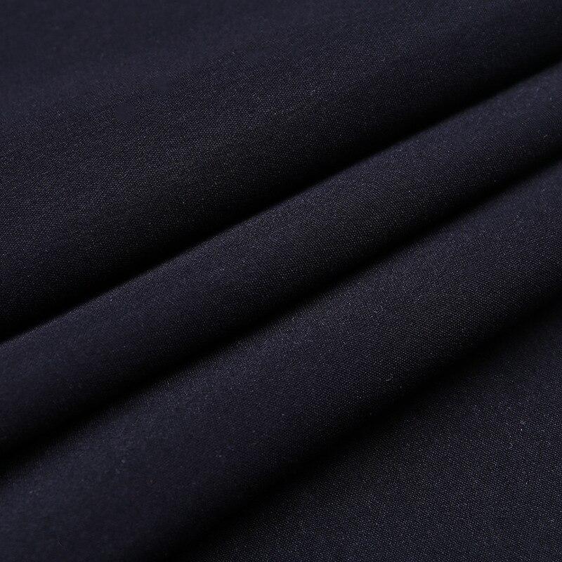 Close-up of smooth black fabric, perfect for vintage gothic pleated skirts and punk grunge styles.