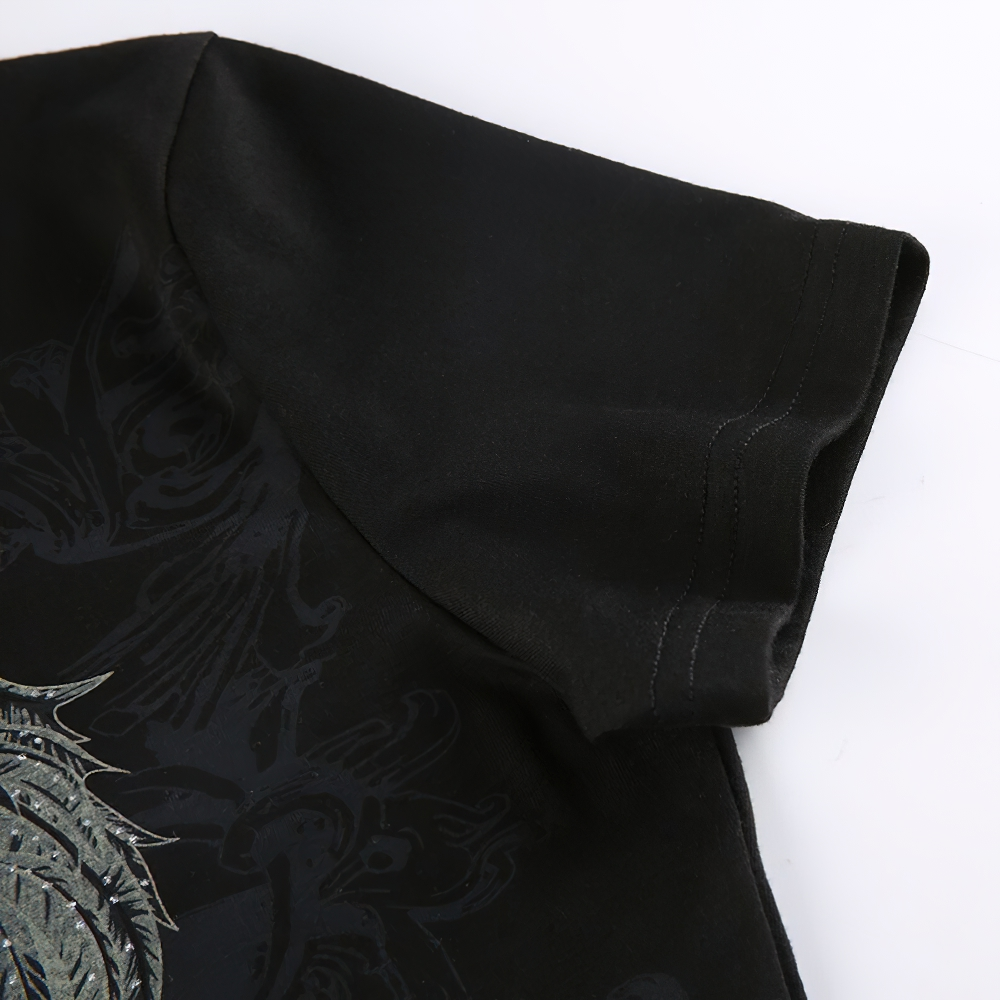 Close-up of vintage black short sleeve crop top featuring a stylish gothic print and grunge design.