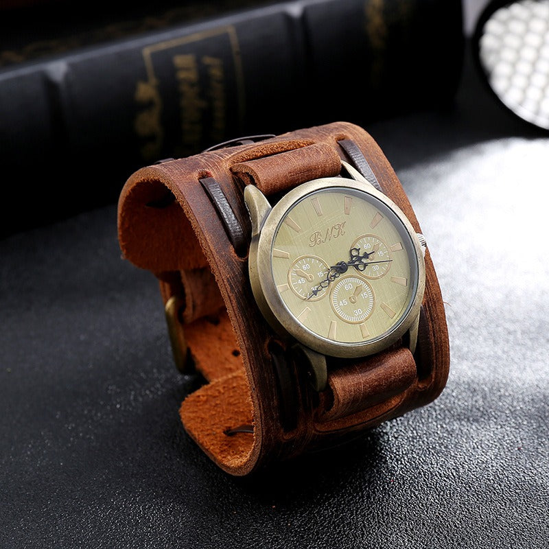 Vintage leather strap watch with a unique bronze dial, perfect for rock and goth fashion lovers.