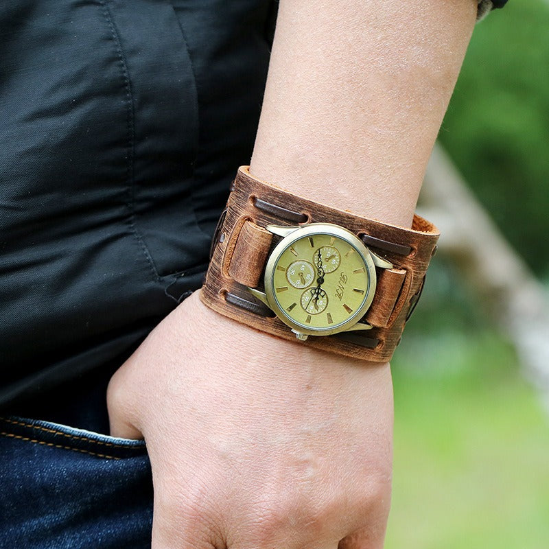 Vintage Rock style leather strap watch on a wrist, featuring a classic dial and unique design.