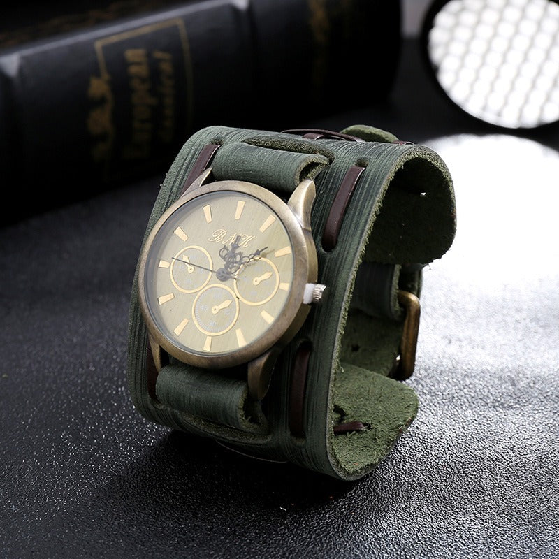 Vintage rocker watch with olive green leather strap, perfect for goth outfits and unique style.