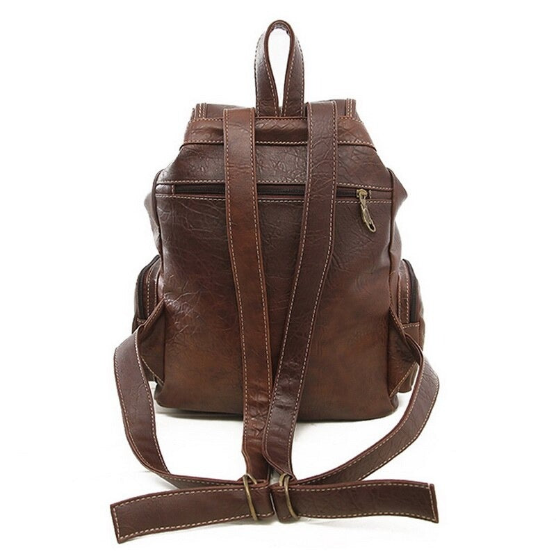 Vintage PU leather women's backpack with stylish design and comfortable straps for alternative fashion outfits.