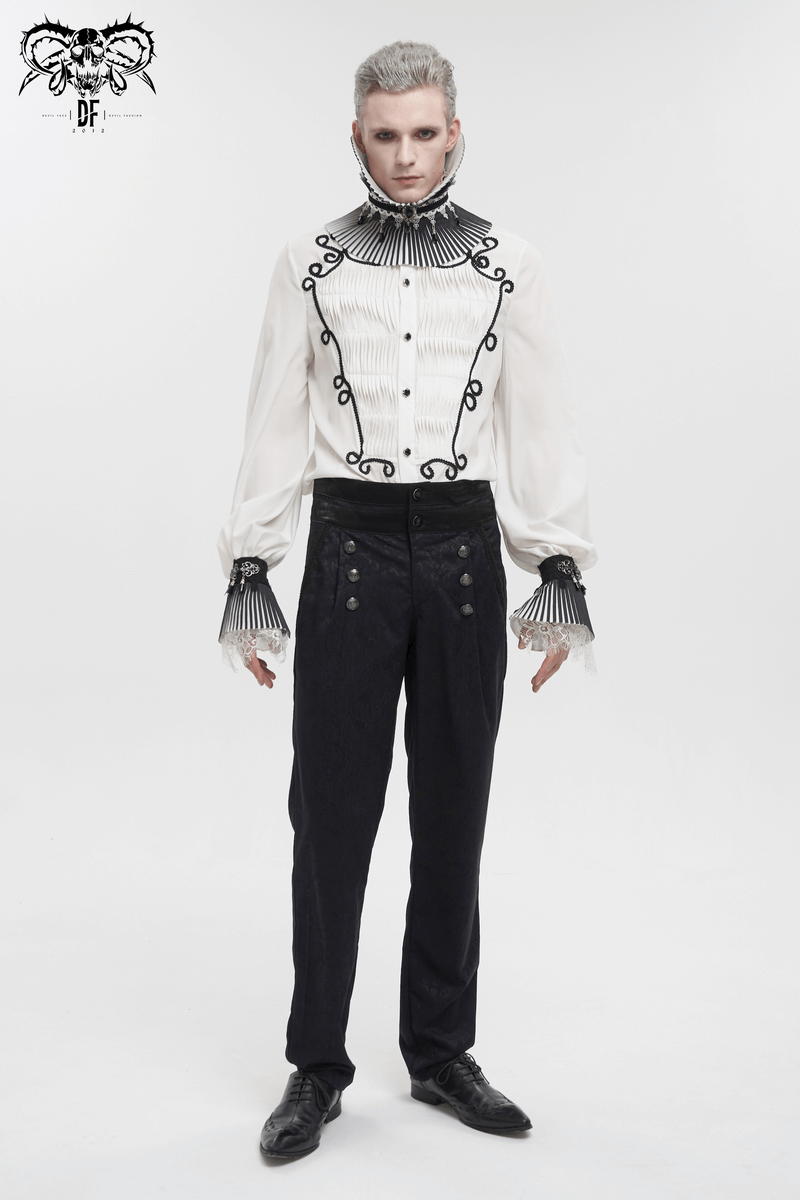 Gothic male model wearing vintage high-waisted black trousers with buttons and a stylish shirt.